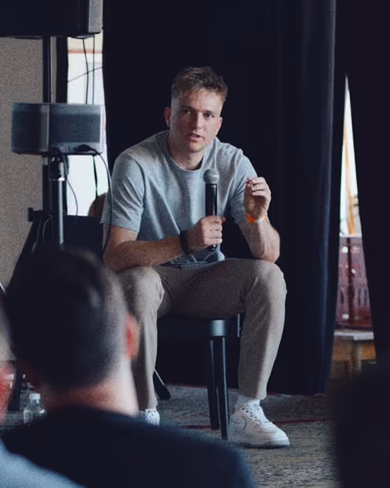 Freelance designer and Webflow developer Jaroslav Dlask speaking at design conference.