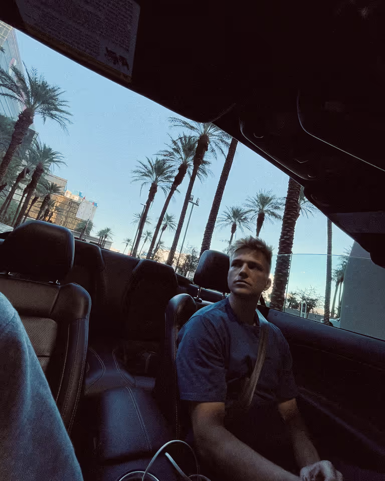 Nomadic freelance designer and Webflow developer Jaroslav Dlask driving a Mustang in USA.
