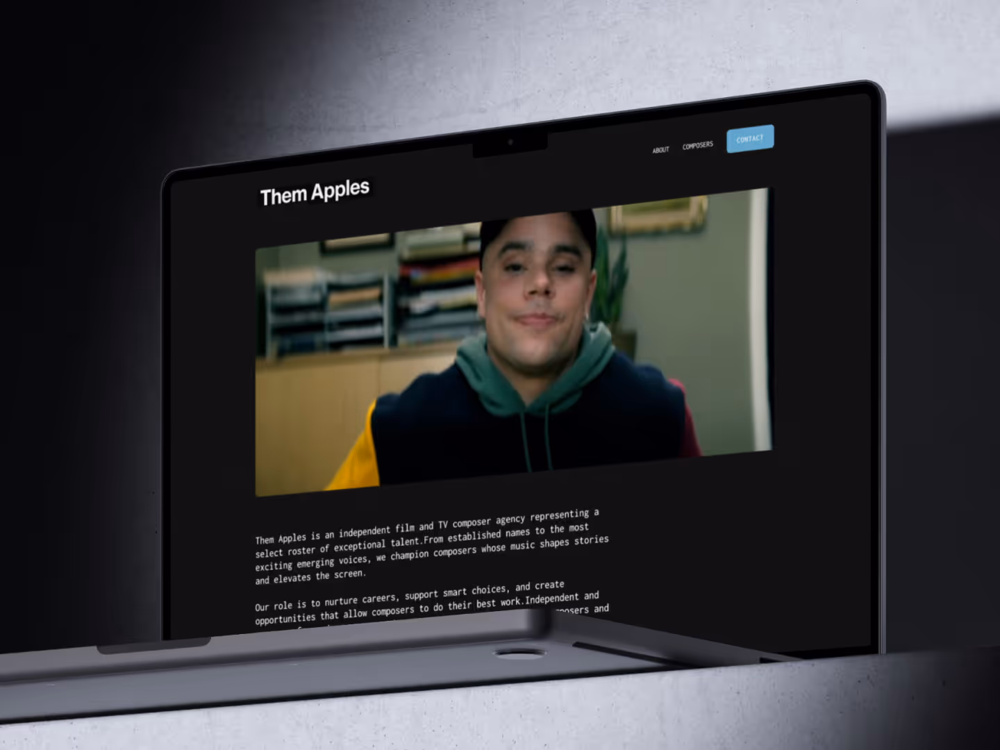Dark grainy website for a composer managment company Them Apples.